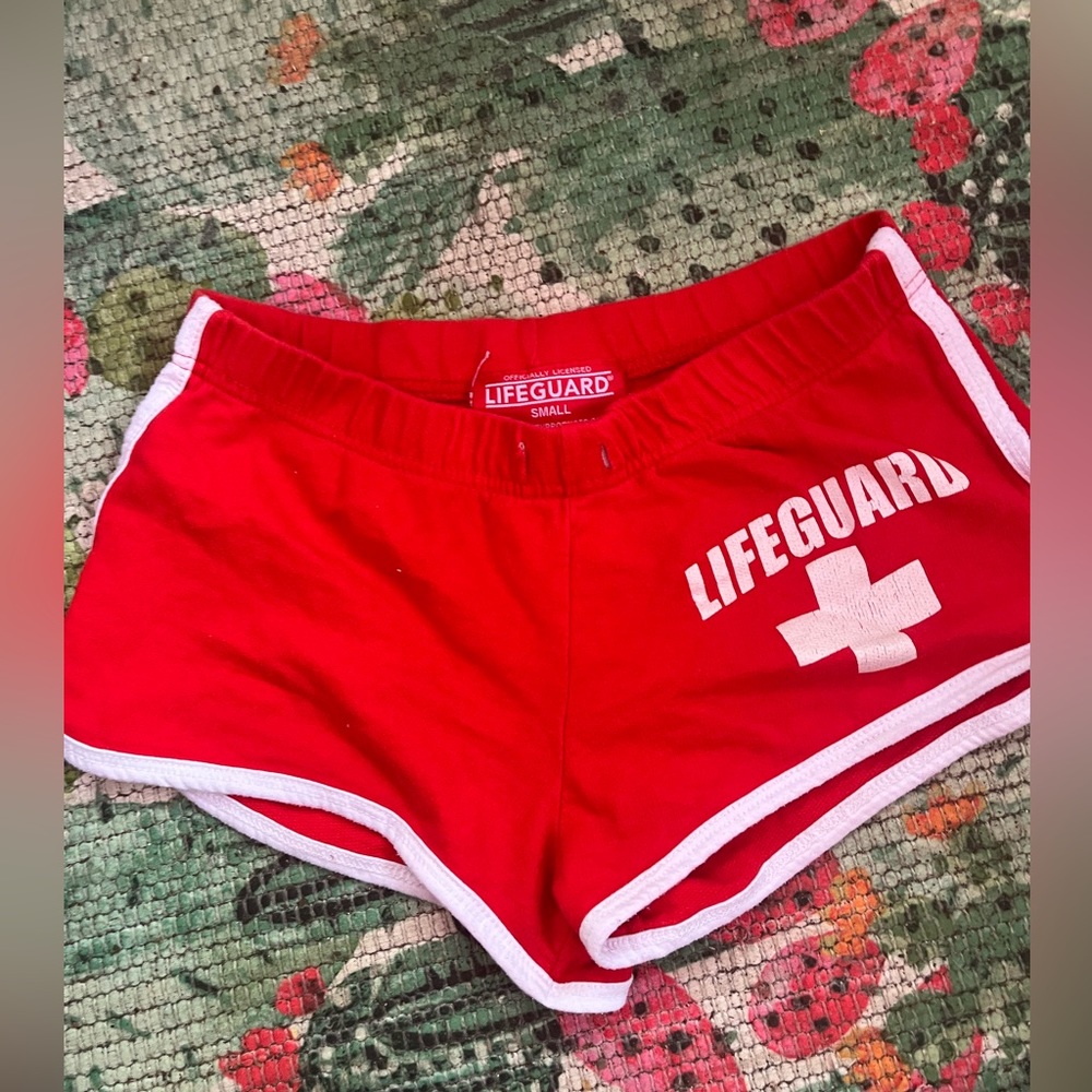 Lifeguard shorts size small Daytona Beach on back like new